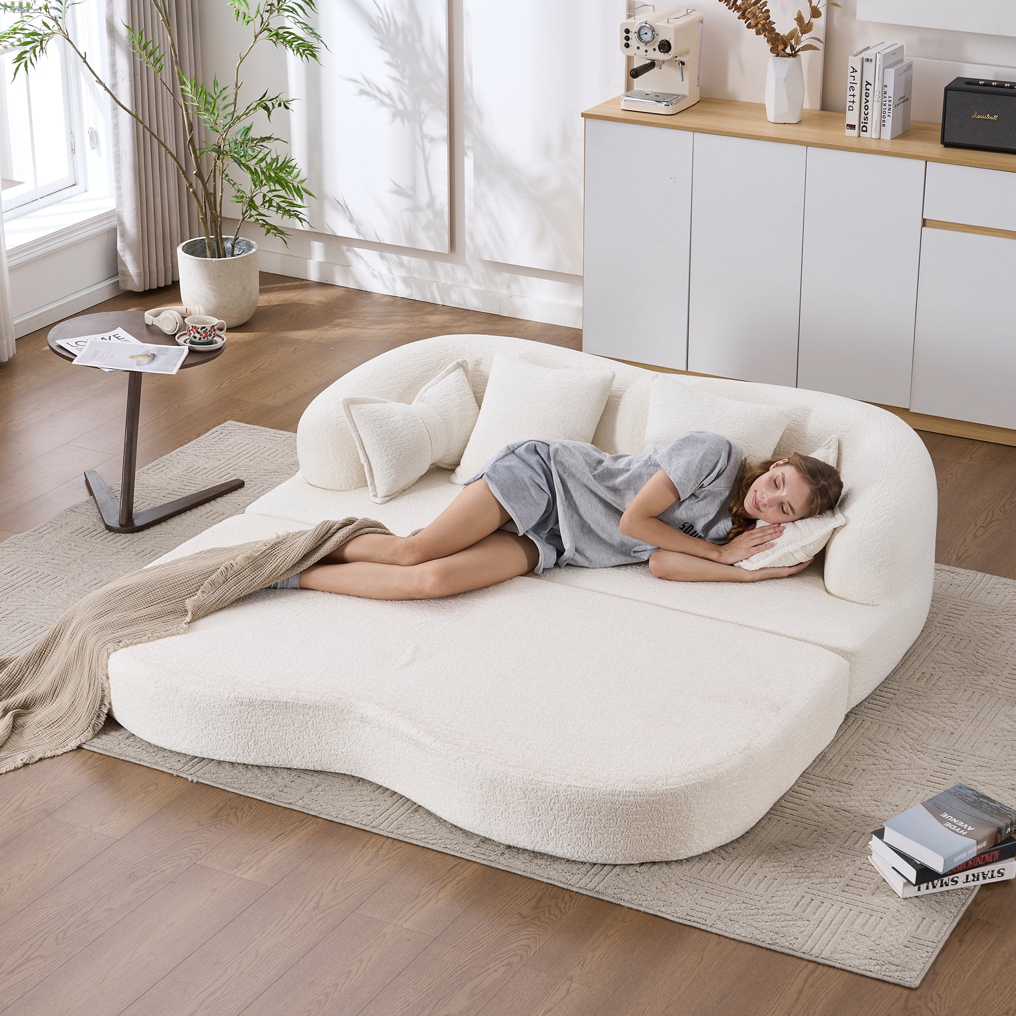 70" Foldable Sofa Bed with 4 Pillows – Milk White.